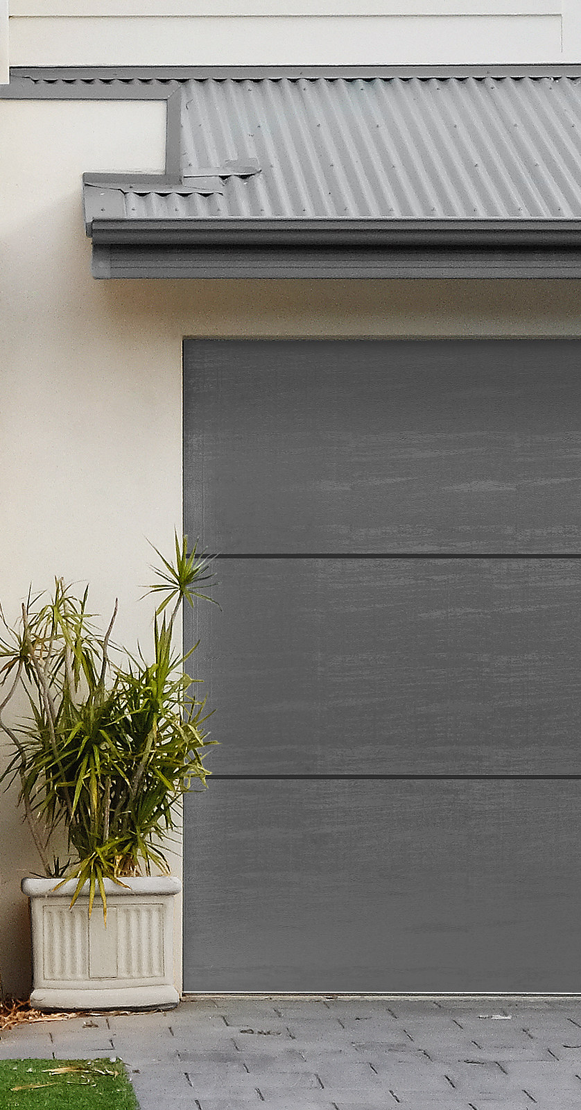 Flush charcoal modern garage door with clean horizontal panels