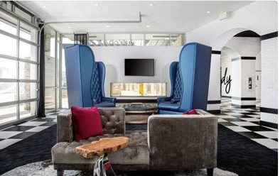 Full view glass door in a luxury lounge with checkered floor