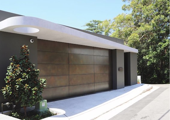 Modern specialty finish garage door with metallic horizontal panels